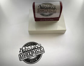 image of pre-inked stamp and impression