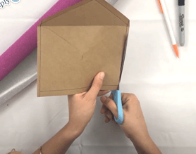 Scissors cutting envelope for DIY craft